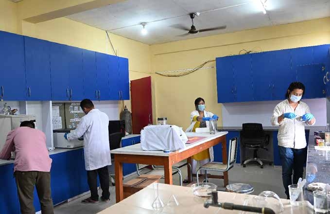 Renovated Toxicology Laboratory with wall mounted modular tables and cabinets